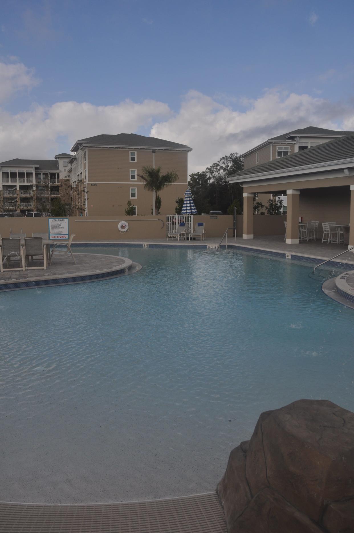 A zero entry pool and a splash pad for children are some of the amenities at The Reef, an apartment complex in Fort Myers.