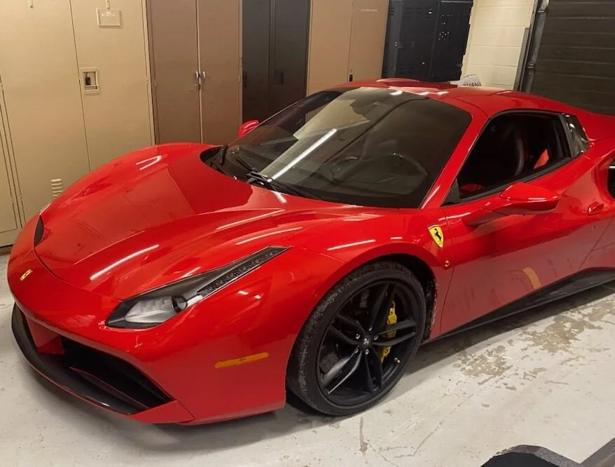 Stolen Ferrari, firearms among items seized as police arrest Bristol's Hope man