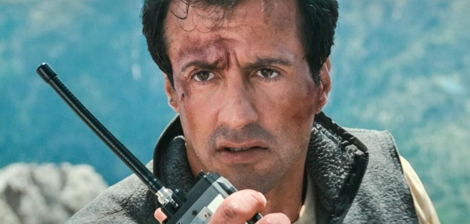 USA. Sylvester Stallone in a scene from the (C)TriStar Pictures movie: Cliffhanger (1993) . Plot: A botched mid-air heist results in suitcases full of cash being searched for by various groups throughout the Rocky Mountains. Ref: LMK110-J7244-260721  Supplied by LMKMEDIA. Editorial Only. Landmark Media is not the copyright owner of these Film or TV stills but provides a service only for recognised Media outlets. pictures@lmkmedia.com