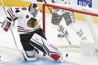 Chicago Blackhawks goaltender Petr Mrazek is scored on by Montreal Canadiens' Cole Caufield (not shown) during the second period of an NHL hockey game in Montreal, Saturday, Oct. 14, 2023. (Graham Hughes/The Canadian Press via AP)