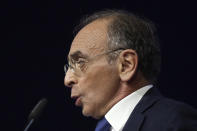 French far right presidential candidate Eric Zemmour delivers his speech during his first rally, Sunday, Dec. 5, 2021 in Villepinte, north of Paris. Far-right former French TV pundit Eric Zemmour is holding his first campaign rally, a few days after he formally declared his candidacy for April's presidential election in a video relaying his anti-migrants, anti Islam views. A first round is to be held on April, 10, 2022 and should no candidate win a majority of the vote in the first round, a runoff will be held between the top two candidates on April 24, 2022. (AP Photo/Rafael Yaghobzadeh)