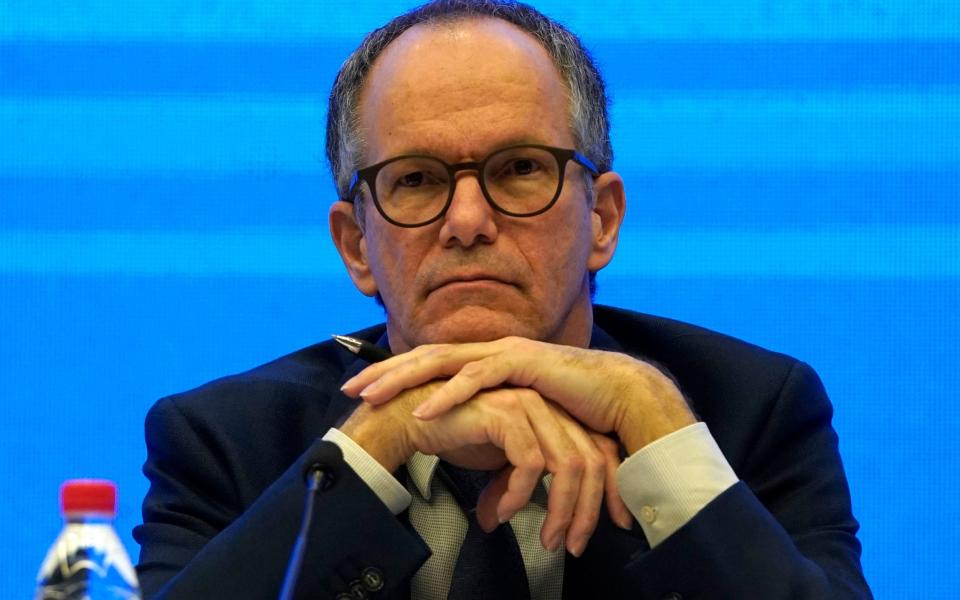 Peter Ben Embarek of a World Health Organisation team attends a joint press conference - Ng Han Guan/AP Photo