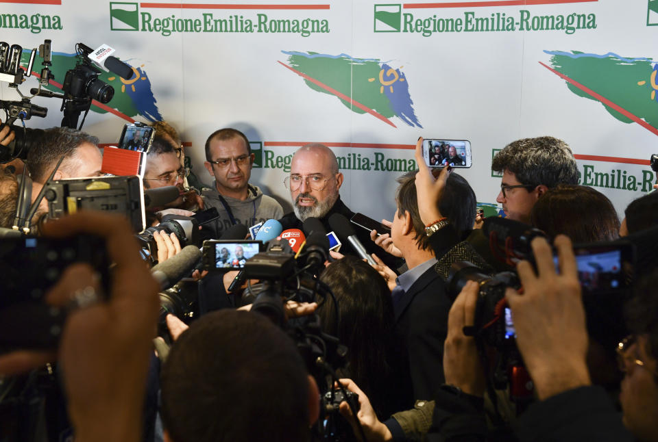 Center-left candidate Stefano Bonaccini meets the media after polls closed in a regional election for the region of Emilia Romagna, in Bologna, late Sunday, Jan. 26, 2020. Nearly complete results Monday, Jan. 27, 2020, of balloting for the governorship of the prosperous Emilia-Romagna region had the League's candidate some 8 percentage points behind the 51.4 percent garnered in Sunday's balloting, by the incumbent governor, of the center-left Democrats, Bonaccini. (Massimo Paolone/LaPresse via AP)