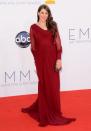 Mayim Bialik looked worlds away from her nerdy and fashion averse character on “The Big Bang Theory” in this custom floor-length burgundy Pamella Roland gown with a draped front. Though she didn’t win the Emmy for outstanding supporting actress in a comedy series, she was hoping to drown her sorrows with a certain fellow nominee who was also passed over this year. “#emmys Clive Owen: it's ok. I lost, too,” Mayim tweeted after the show. “Let's have a drink and talk all about it.” Wonder if he took her up on the offer!