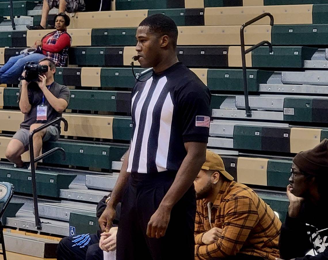 Former Irmo High and South Carolina basketball standout Justin McKie refs a game at the Chick-fil-A Classic on Dec. 30, 2022.