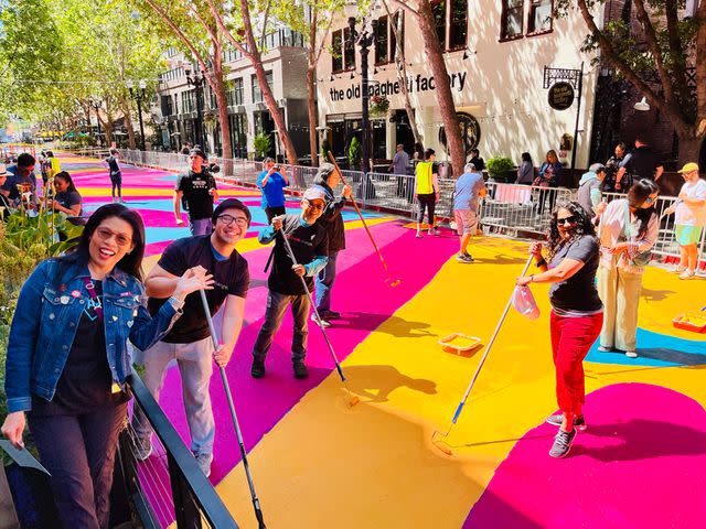 <p>Adobe</p> Adobe employees join local volunteers to paint a landmark mural in downtown San Jose, Calif., in June.