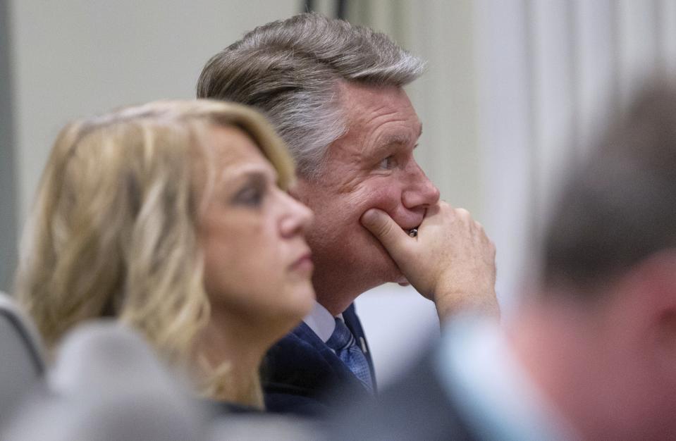 Mark Harris, Republican candidate in North Carolina's 9th Congressional race, listens to testimony during the third day of a public evidentiary hearing on the 9th Congressional District voting irregularities investigation Wednesday, Feb. 20, 2019, at the North Carolina State Bar in Raleigh, N.C. (Travis Long/The News & Observer via AP, Pool)
