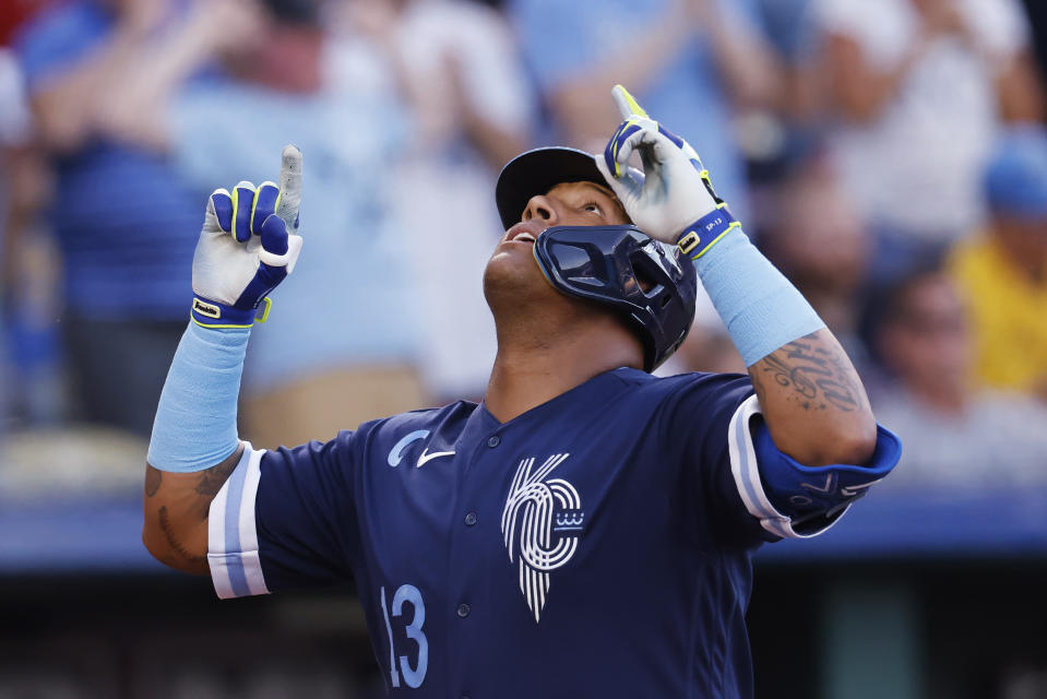 Kansas City Royals' Salvador Perez reacts as he crosses home plate on a home run against the Boston Red Sox during the first inning of a baseball game in Kansas City, Mo., Friday, Sept. 1, 2023. (AP Photo/Colin E. Braley)