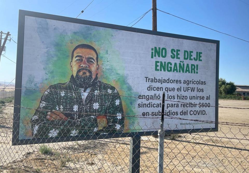 A Wonderful-sponsored sign along Highway 33 near the Kern County community of Lost Hills says in Spanish that the United Farm Workers misled workers during the unionization process. Photographed Sunday, June 30, 2024.