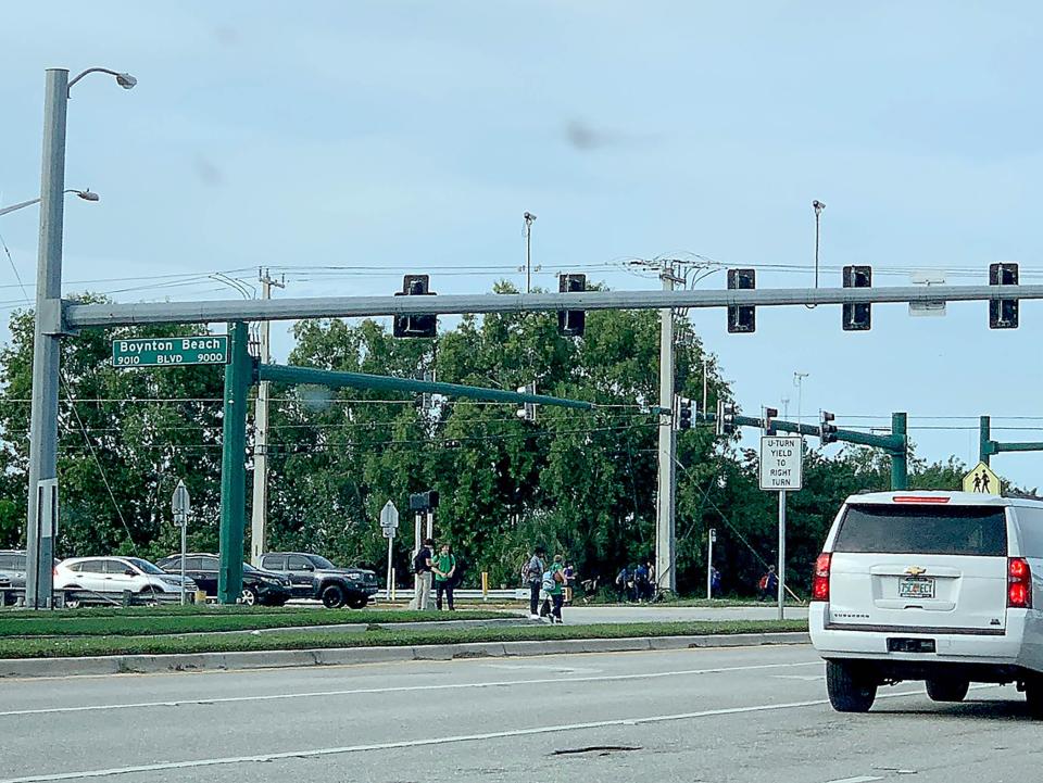 A nearby charter school has been seeking a crossing guard for students at the busy intersection of Lyons Road and Boynton Beach Boulevard to no avail.