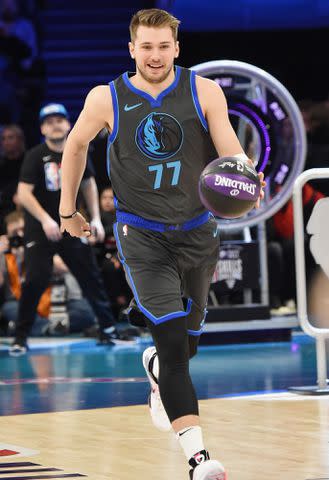 <p>Kevin Mazur/Getty</p> Luka Doncic participates in the Taco Bell Skills Challenge during the 2019 State Farm All-Star Saturday Night on February 16, 2019 in Charlotte, North Carolina.