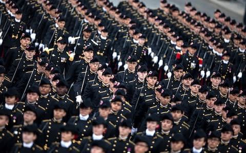 Pupils of the Polytechnique school march during the annual Bastille Day military parade  - Credit: Rex