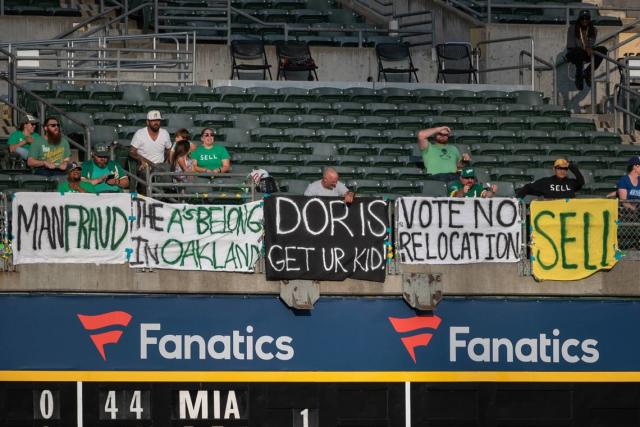 A's met by fans in Oakland with chants of `Sell the team!