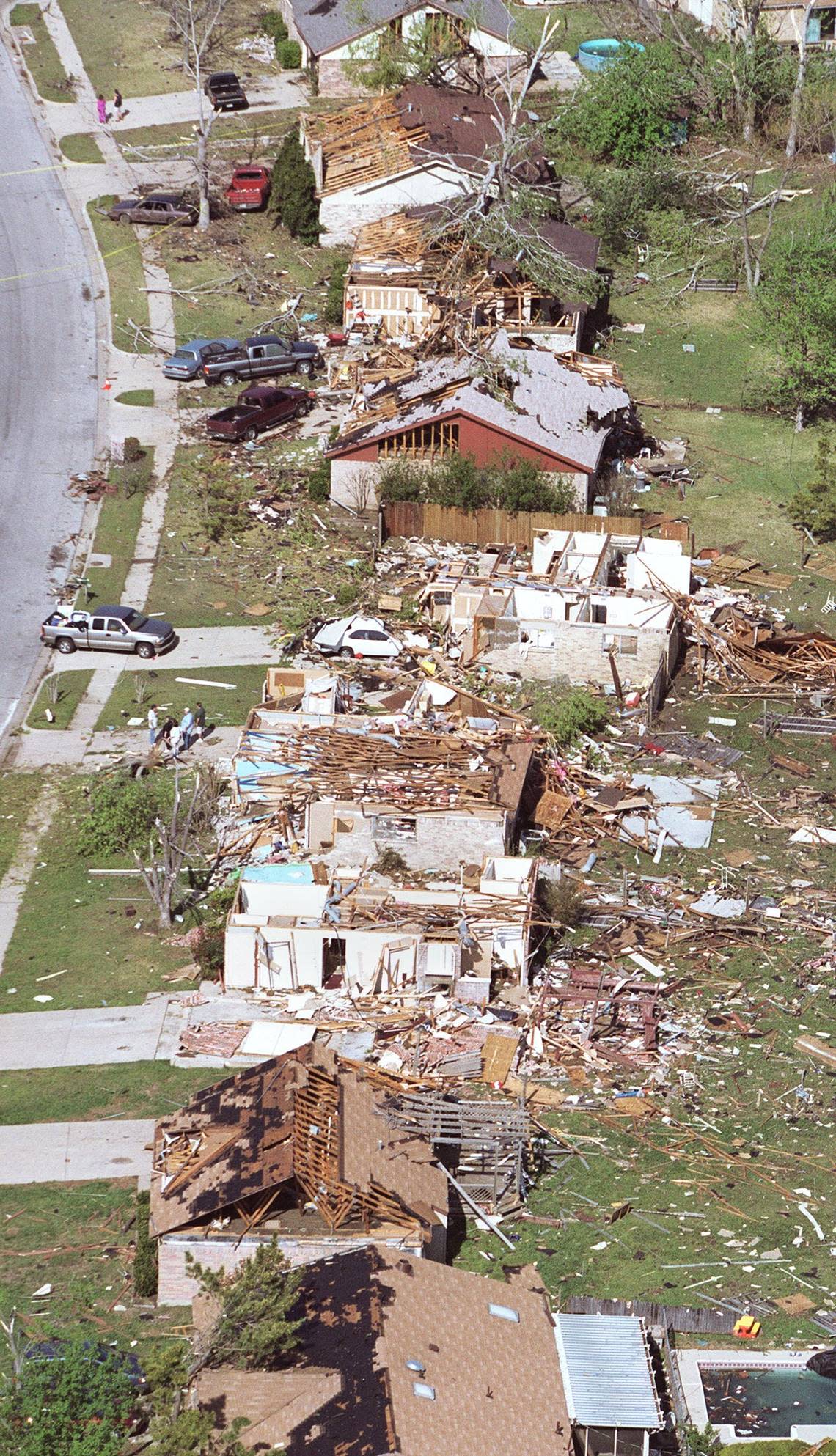 These Arlington homes on West Embercrest Drive, a block west of Matlock Road, appeared to be the first to be hit by a tornado on March 28, 2000.