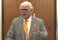 In this screen grab from video, defense attorney Earl Gray questions a potential juror as Hennepin County Judge Regina Chu presides over jury selection Wednesday, Dec. 1, 2021, in the trial of former Brooklyn Center police Officer Kim Potter in the April 11, 2021, death of Daunte Wright, at the Hennepin County Courthouse in Minneapolis, Minn. (Court TV via AP, Pool)