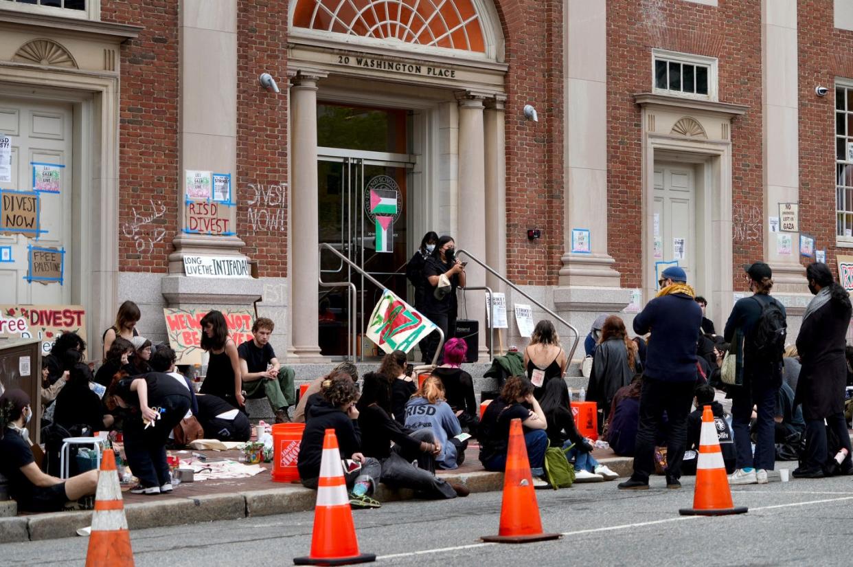 Students rally outside the Rhode Island School of Design building at 20 Washington Pl. on Monday afternoon where classmates are staging a sit-in and calling on RISD President Crystal Williams to divest from Israel. Photographed on May 6, 2024.