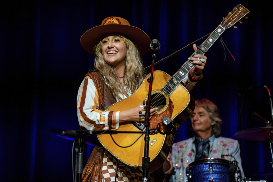 FILE - Lainey Wilson performs during Marty Stuart's 19th Annual Late Night Jam at the Ryman Auditorium on June 8, 2022, in Nashville, Tenn. Wilson will headline the Country Bay Music Festival scheduled for Nov. 11-12 at the historic Miami Marine Stadium in Biscayne Bay, Fla. (AP Photo by (Amy Harris/Invision/AP, File)