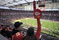 Kansas City Chiefs fans cheer as they watch their team play the Miami Dolphins during the first half of an NFL football game Sunday, Nov. 5, 2023, in Frankfurt, Germany. (AP Photo/Markus Schreiber)