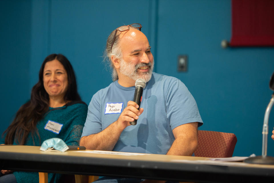 Asheville City Schools Board of Education Candidate Pepi Acebo speaks a forum at A-B Tech on April 22, 2022.