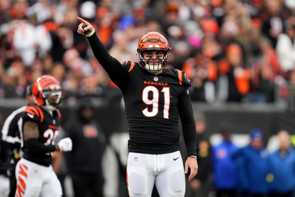 Cincinnati Bengals defensive end Trey Hendrickson (91) signals for a penalty against the Cleveland Browns in the first quarter during a Week 14 NFL game, Sunday, Dec. 11, 2022, at Paycor Stadium in Cincinnati. Mandatory Credit: Kareem Elgazzar-The Cincinnati Enquirer-USA TODAY Sports