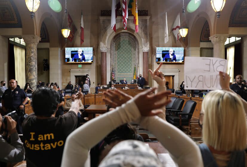 LOS ANGELES, CA - OCTOBER 12, 2022: Members of the community are calling for the resignation of Nury Martinez, Kevin de Leon and Gil Cedillo at City Hall Council chambers in downtown Los Angeles on Wednesday, October 12, 2022. (Christina House / Los Angeles Times)