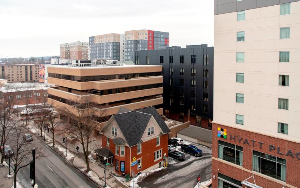 The view from the top of the Beaver Avenue Garage is now full of high rises included the Metropolitan, the Standard, and the Fraser Center on Wednesday, Feb. 2, 2022.