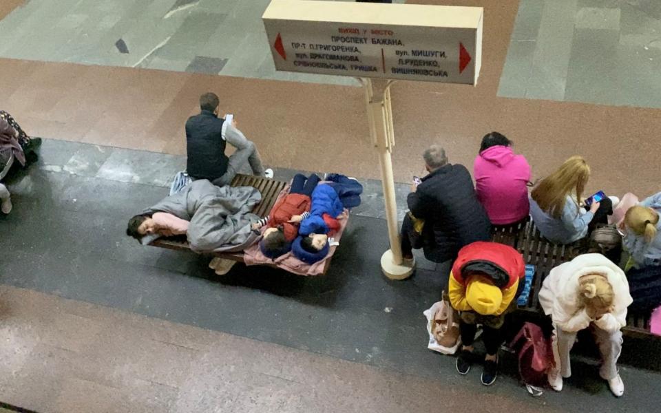 People take shelter in a subway station in Kyiv - Twitter @taniakovba/Twitter @taniakovba via REUTERS