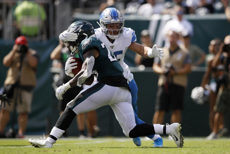 Detroit Lions' Miles Killebrew, right, tackles Philadelphia Eagles' Miles Sanders during the first half of an NFL football game, Sunday, Sept. 22, 2019, in Philadelphia. (AP Photo/Matt Rourke)