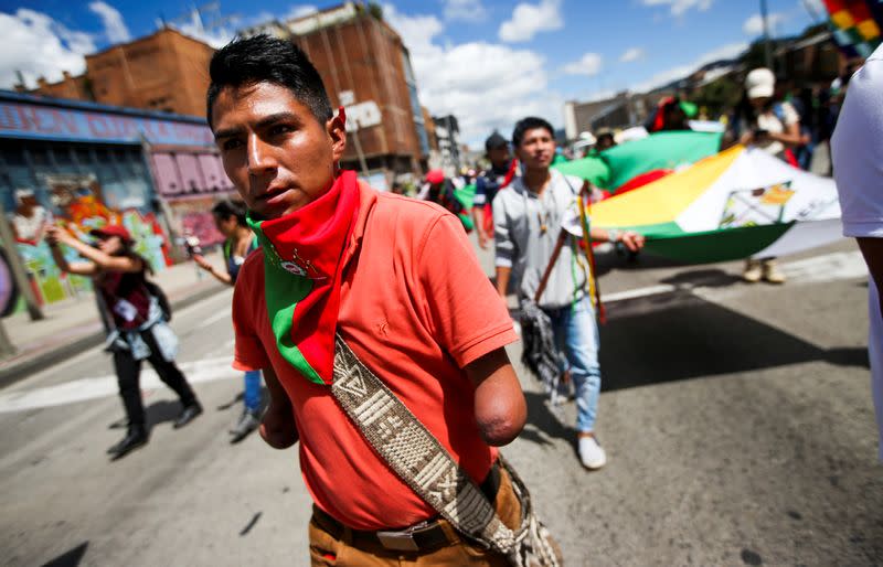 Demonstrators take part in a protest as a national strike continues in Bogota