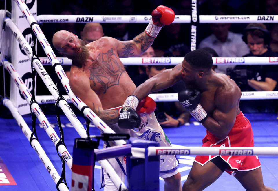 LONDON, ENGLAND - AUGUST 12: Anthony Joshua knocks out Robert Helenius during the Heavyweight fight between Anthony Joshua and Robert Helenius at The O2 Arena on August 12, 2023 in London, England. (Photo by Julian Finney/Getty Images)