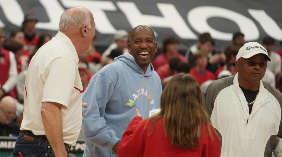Feb 26, 2023; Columbus, OH, USA; Former Ohio State captain Michael Redd talks with other captains as they were honored during halftime of the NCAA basketball game between Ohio State and Illinois on Feb. 26, 2023 at Value City Arena. Mandatory Credit: Doral Chenoweth-The Columbus Dispatch