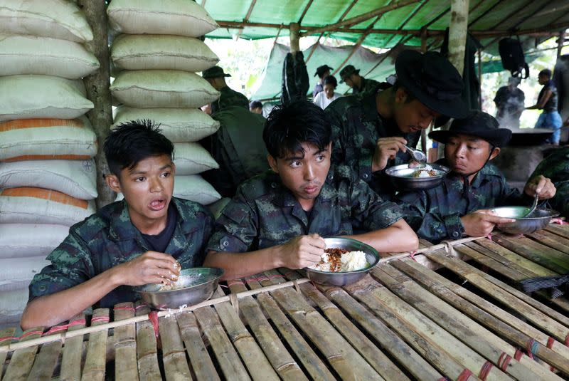 The Wider Image: In Myanmar jungle, civilians prepare to battle military rulers