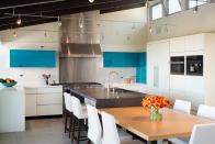 <p>In this kitchen by the Dawson Design Group, just the top cabinets ar rendered in a glossy aqua blue, creating a pop-art flash in an otherwise completely streamlined space.</p>