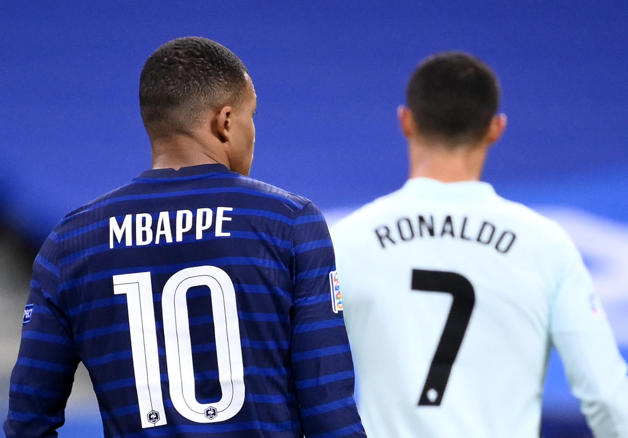 Kylian Mbappé and Cristiano Ronaldo, seen here in a 2020 match, will face off on Friday. (Franck Fife/AFP via Getty Images)