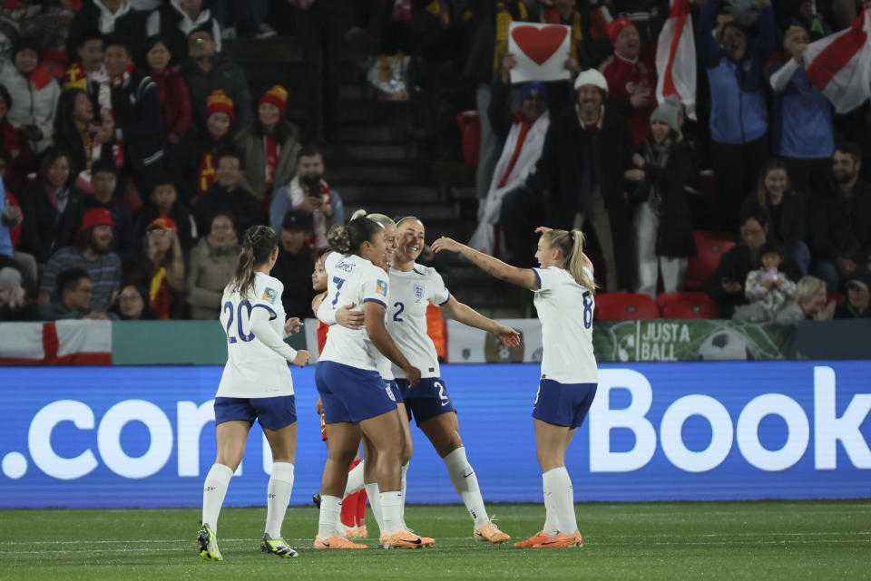 England's Alessia Russo, centre, celebrates with teammate after scored goal during the Women's World Cup Group D soccer match between China and England in Adelaide, Australia, Tuesday, Aug. 1, 2023. (AP Photo/James Elsby)