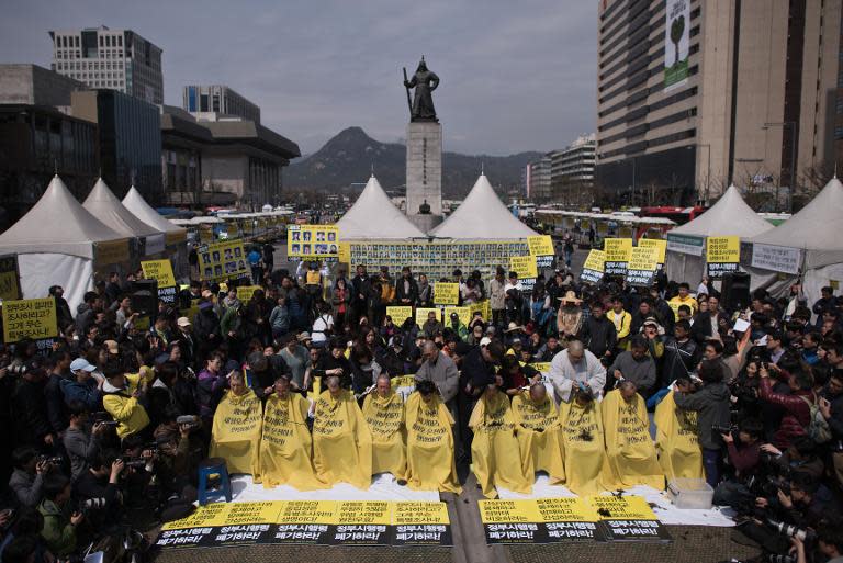 Relatives of victims of the Sewol ferry accident have their heads shaved during a protest, ahead of the anniversary of the disaster, in Seoul, on April 2, 2015