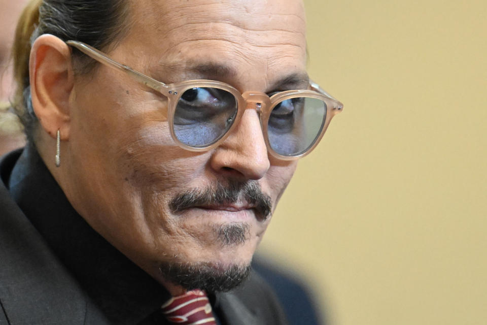 Actor Johnny Depp looks on in the courtroom at the Fairfax County Circuit Court in Fairfax, Va., Tuesday May 3, 2022. Depp sued his ex-wife Amber Heard for libel in Fairfax County Circuit Court after she wrote an op-ed piece in The Washington Post in 2018 referring to herself as a "public figure representing domestic abuse." (Jim Watson/Pool photo via AP)