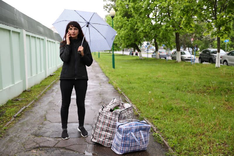 Journalist Katerina Borisevich walks out of a prison in Gomel