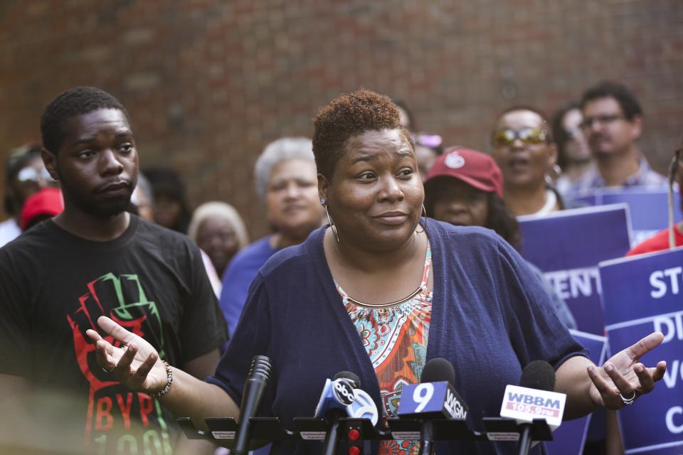 In this Tuesday, July 23, 2019 photo, Chicago Alderman, Jeanette Taylor, right, speaks during a news conference and rally in Chicago. (AP Photo/Amr Alfiky)