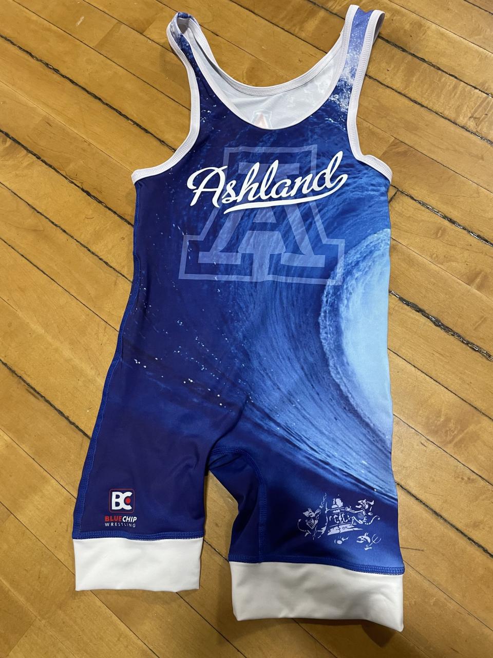 An Ashland High wrestling singlet that features a bell and two skeletons on the bottom part of the left leg.