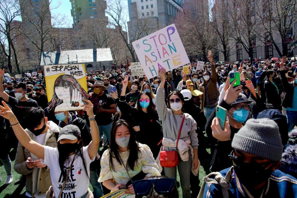 People take part in a rally against hate and the rising violence against Asians living in the U.S., at Columbus Park in the Chinatown section of the Manhattan borough of New York, on Sunday, March 21, 2021.