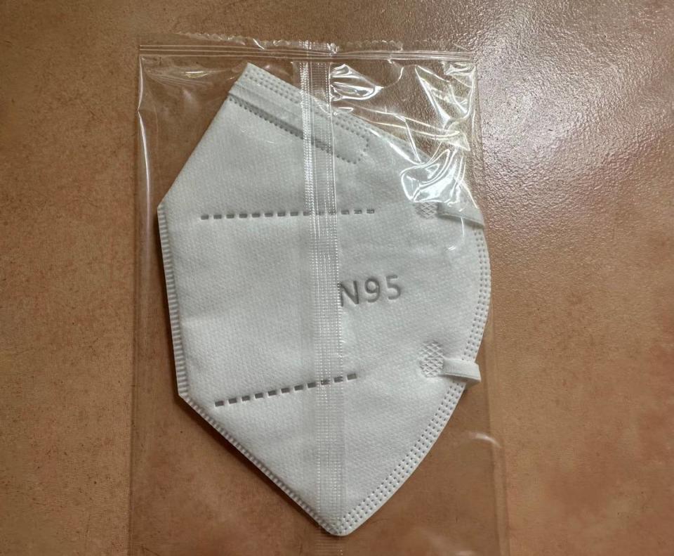 An N95 mask, like the ones you may have left over from the pandemic, may offer some form of protection from air pollution from the Canada wildfire should you be in an affected area, experts suggest.