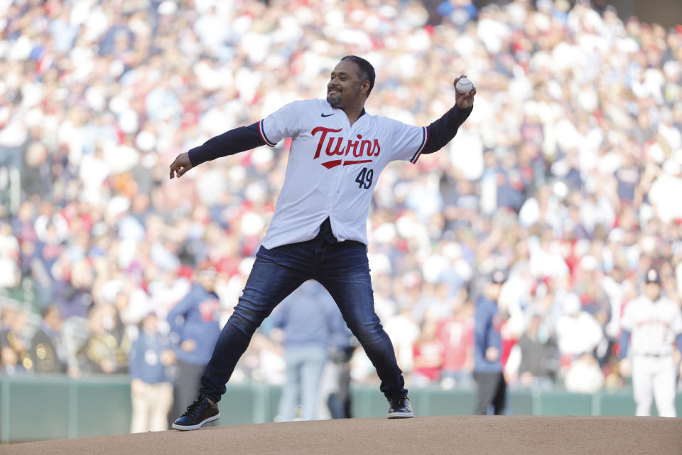 Former Minnesota Twins pitcher Johan Santana wears a Pablo Lopez jersey and throws out the ceremonial first pitch before Game 3 of an American League Division Series baseball game against the Houston Astros, Tuesday, Oct. 10, 2023, in Minneapolis. (AP Photo/Bruce Kluckhorn)