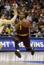 Arizona State guard Jahii Carson (1) drives the ball during the second half of a second-round game against the Texas in the NCAA college basketball tournament Thursday, March 20, 2014, in Milwaukee. (AP Photo/Jeffrey Phelps)