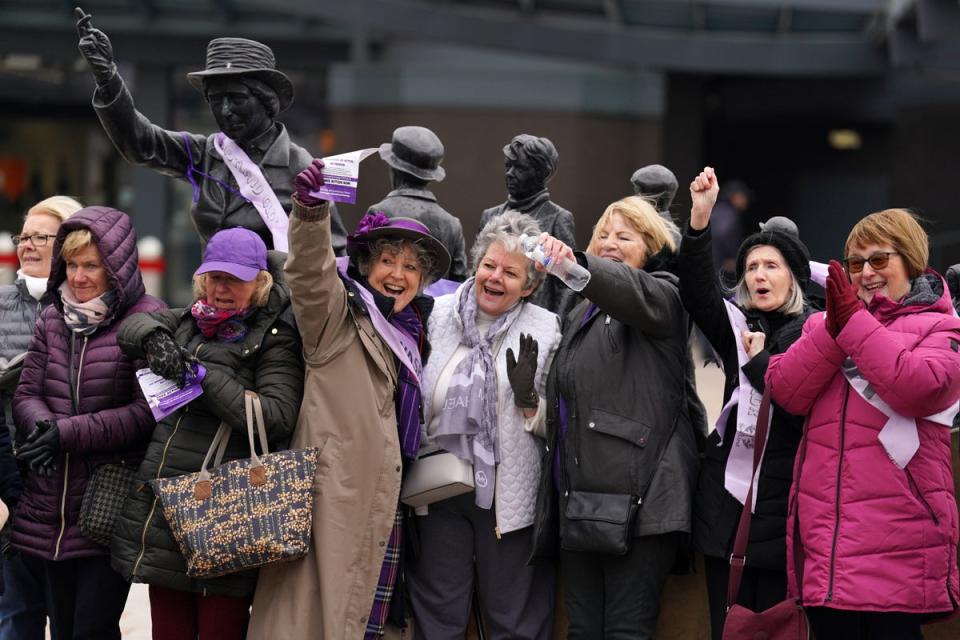 Women Against State Pension Inequality (Waspi) campaigners gather at the statue of political activist Mary Barbour (PA)