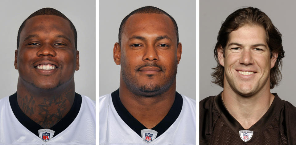 FILE - From left are NFL football players Anthony Hargrove, in 2010; Will Smith, in 2011; and Scott Fujita, in 2011. The NFL Players Association filed a lawsuit against the NFL on behalf of three players suspended in connection with the bounty investigation, calling Commissioner Roger Goodell "incurably and evidently biased." The lawsuit, filed in federal court in New Orleans on Thursday,July 5, 2012, said Goodell violated the labor agreement by showing he had determined Smith, Hargrove and Fujita participated in a bounty system before serving as an arbitrator at their hearing. (AP Photo/File)