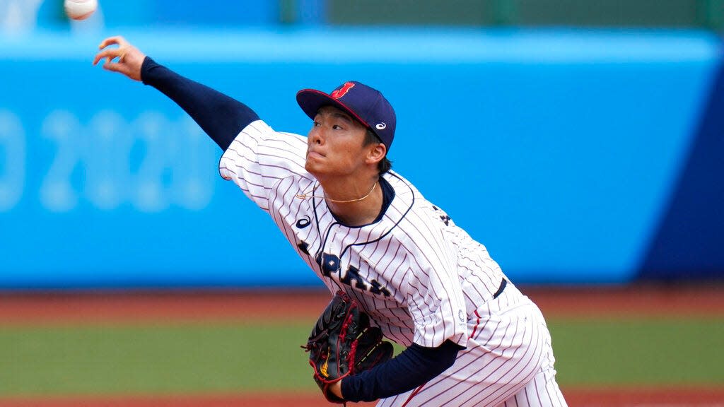 Japan starting pitcher Yoshinobu Yamamoto throws against the Dominican Republic during the first inning of a baseball game at the 2020 Summer Olympics, Wednesday, July 28, 2021, in Fukushima, Japan.