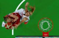2016 Rio Olympics - Basketball - Semifinal - Women's Semifinal Spain v Serbia - Carioca Arena 1 - Rio de Janeiro, Brazil - 18/8/2016. Danielle Page (SRB) of Serbia and Laura Gil (ESP) of Spain compete for ball. REUTERS/Jim Young