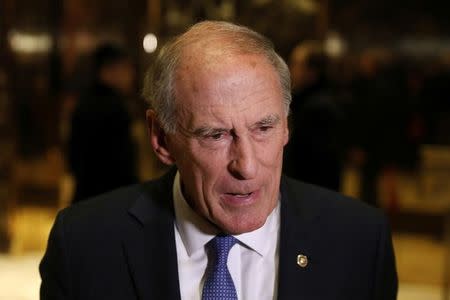 Senator Dan Coats (R-IN) stops to speak to the news media after a meeting at Trump Tower with U.S. President-elect Donald Trump in New York, U.S., November 30, 2016. REUTERS/Lucas Jackson