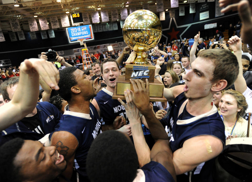 Mount St. Mary's celebrates following a win over Robert Morris in the Northeastern Conference championship NCAA college basketball game on Tuesday, March 11, 2014, in Coraopolis, Pa. Mt. Saint Mary won 88-71.(AP Photo/Don Wright)